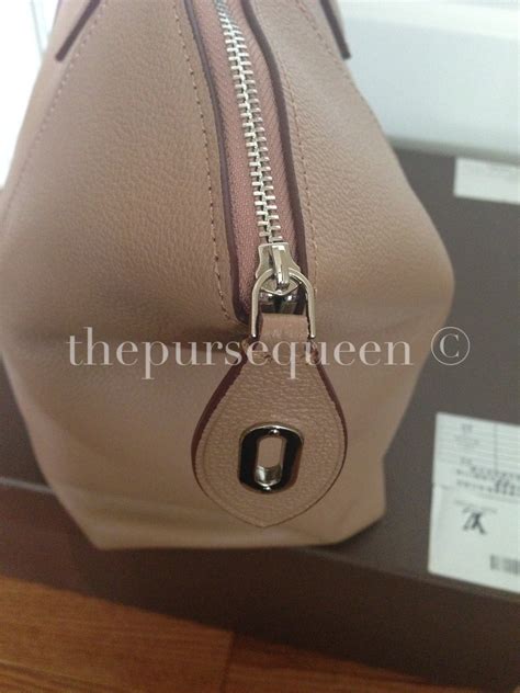 louis vuitton soft lockit replica|louis vuitton false product id.